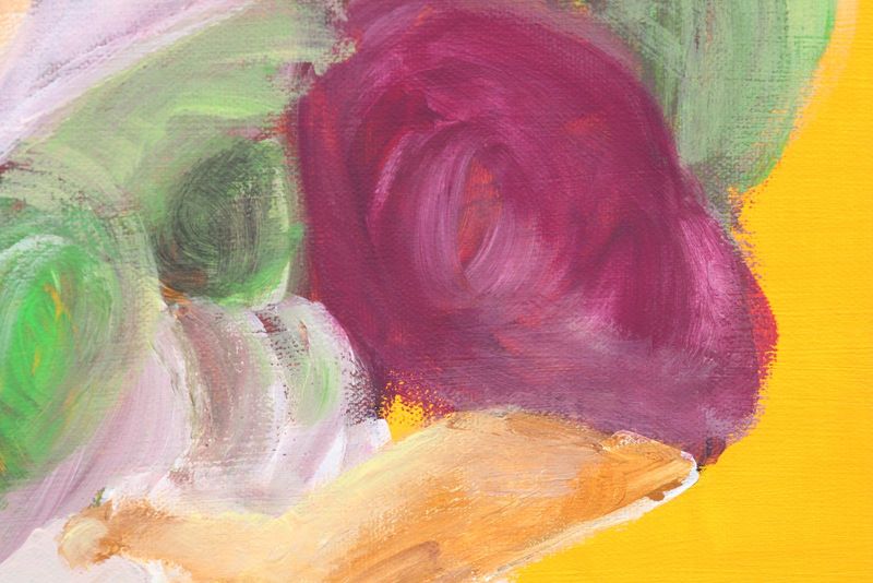 A magenta lobe and a green one from gary grills cooper against orange-yellow.